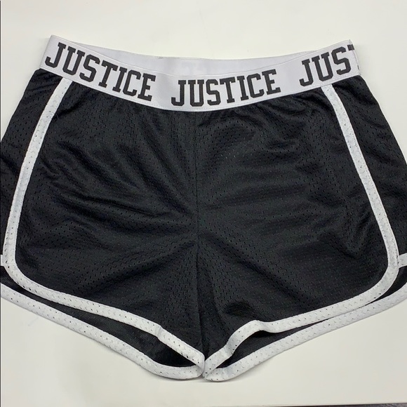 Black loos athletic shorts, with a stretchy waist. - Picture 1 of 3